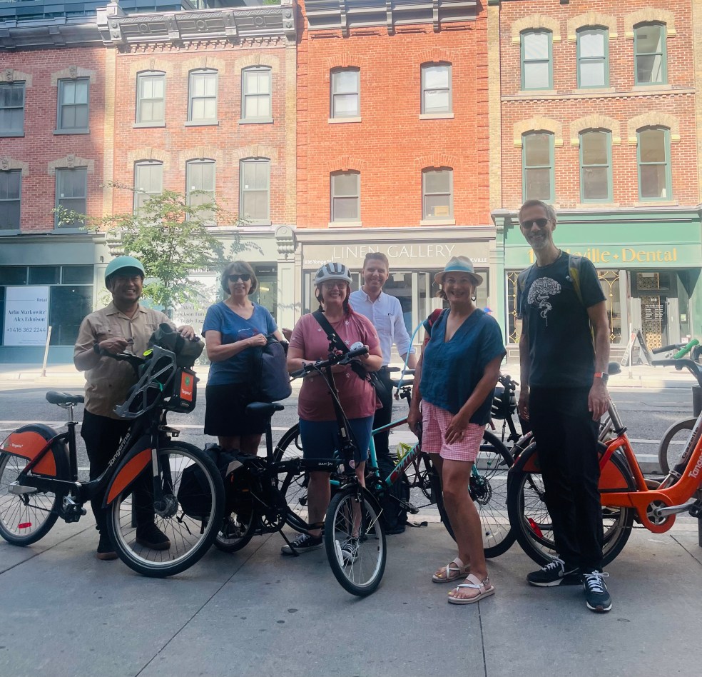 Arcy Canumay, Andrea Bidgood, Alison Stewart, Adrian Salvatore, the Consul General of the Netherlands and his wife pose with bikes.